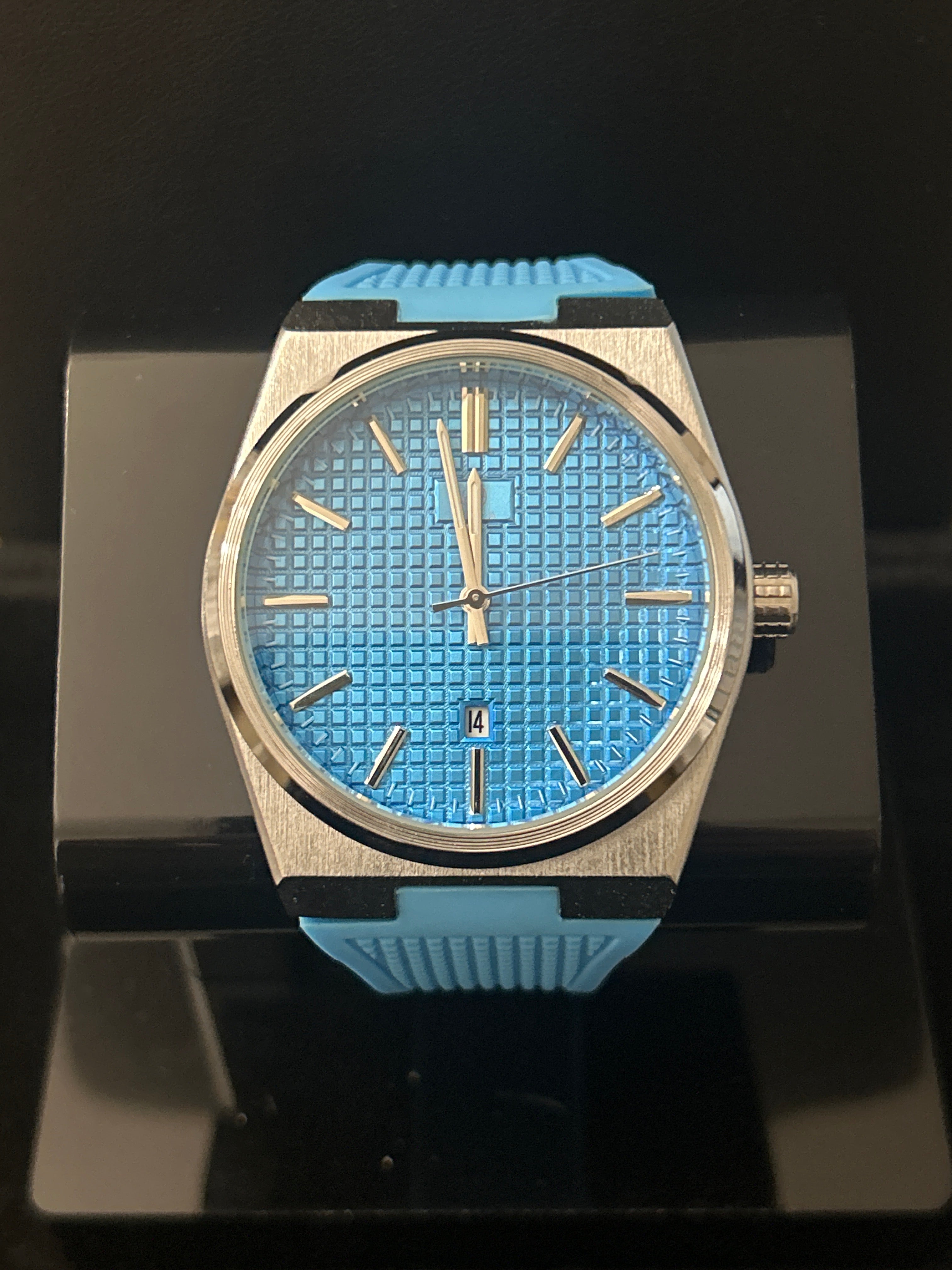 W55 - Silver/Blue Face W/ Blue Rubber Band 42mm