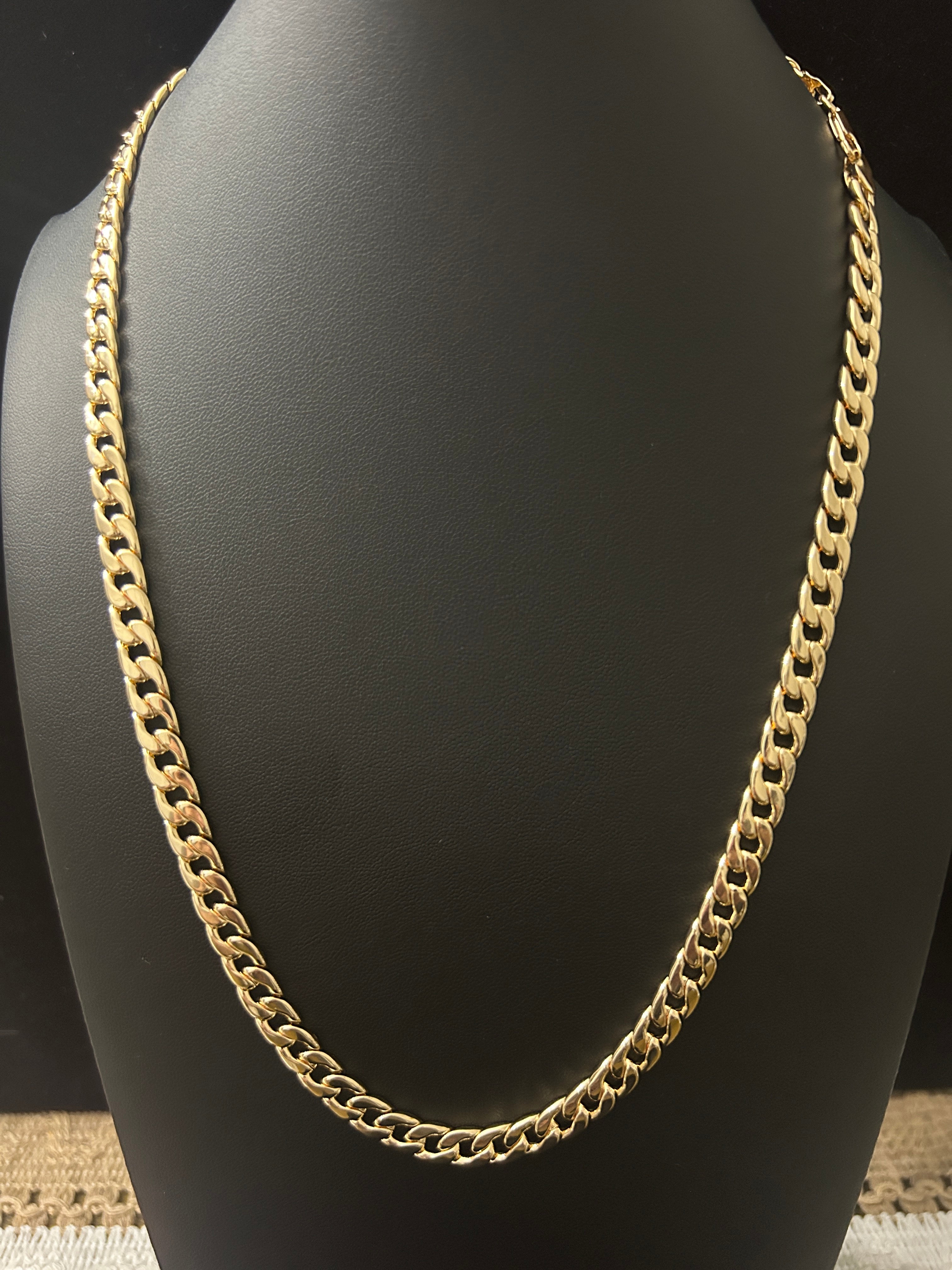 C77 - 14k Gold 24 Inch 7.5 MM Cuban