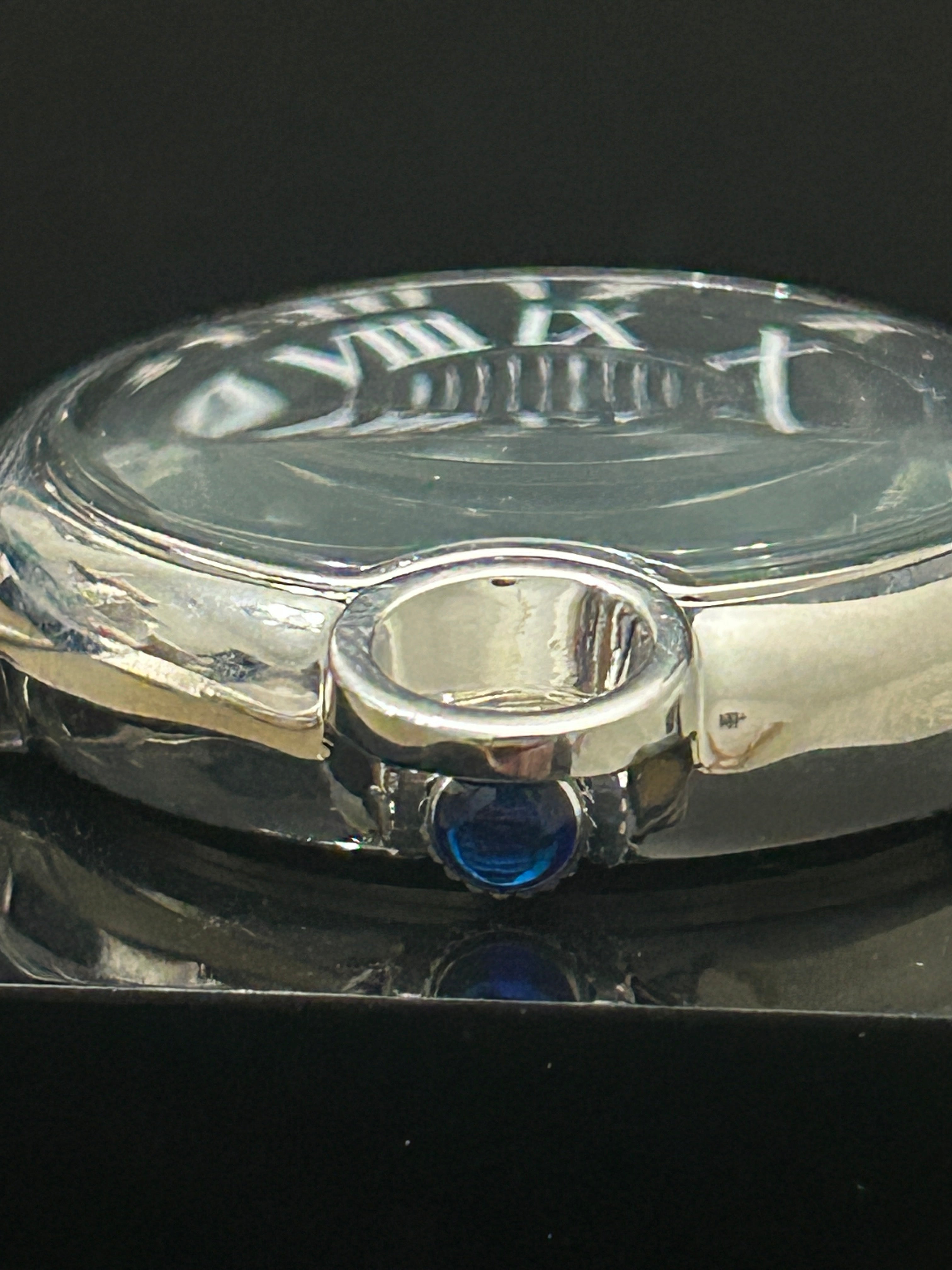 Silver Omega Style 42mm Black Face W/ Blue Hands